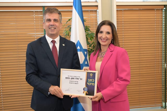  Foreign Minister Eli Cohen is seen alongside Jerusalem Deputy Mayor Fleur Hassan-Nahoum, Israel's newly appointed special envoy for innovation. (photo credit: Shlomi Amsalem/Foreign Ministry)