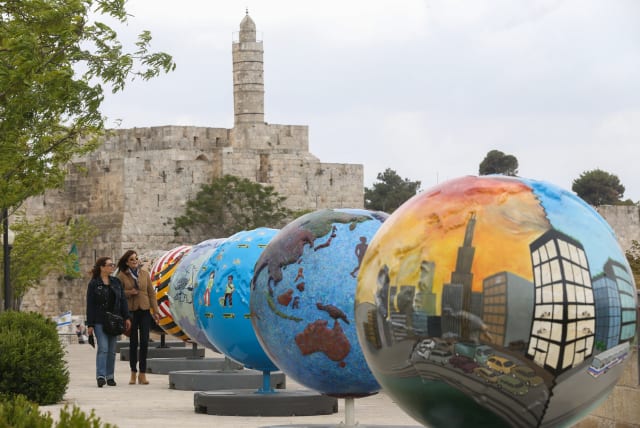  ART INSTALLATION with each globe symbolizing a solution to climate change; in Jerusalem, 2013. (photo credit: NATI SHOHAT/FLASH90)