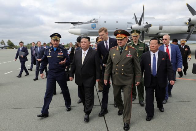  North Korea's leader Kim Jong Un and Russia's Defence Minister Sergei Shoigu inspect Russian military aircraft and missiles put on display at Knevichi aerodrome near Vladivostok in the Primorsky region, Russia, September 16, 2023. (photo credit: Russian Defence Ministry/Handout via REUTERS)