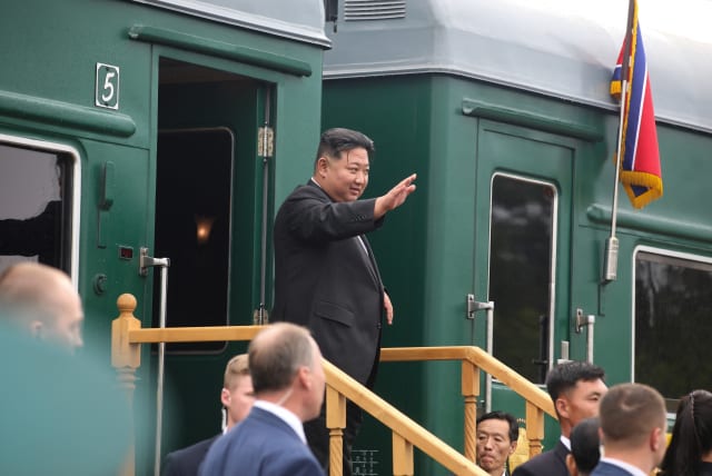  North Korean leader Kim Jong Un waves as he boards his train at a railway station in the town of Artyom outside Vladivostok in the Primorsky region, Russia, September 17, 2023 (photo credit: REUTERS)