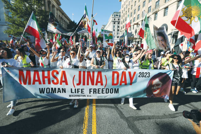  SUPPORTERS OF women’s rights in Iran march in Washington, last weekend, to mark the anniversary of the death of Mahsa Amini. (photo credit: ALLISON BAILEY/REUTERS)