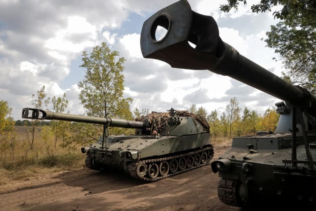  Ukrainian servicemen prepare to fire a M109 self-propelled howitzer towards Russian troops, amid Russia's attack on Ukraine, in Donetsk region, Ukraine September 11, 2023. (photo credit: REUTERS/ANNA VOITENKO)