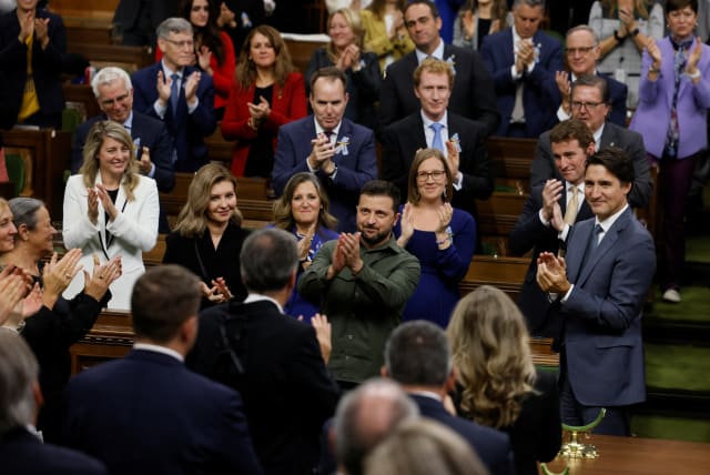  Ukraine's President Volodymyr Zelenskiy is applauded by Canadian Prime Minister Justin Trudeau following his speech at the House of Commons on Parliament Hill in Ottawa, Ontario, Canada September 22, 2023. (photo credit: REUTERS/Blair Gable/Pool)