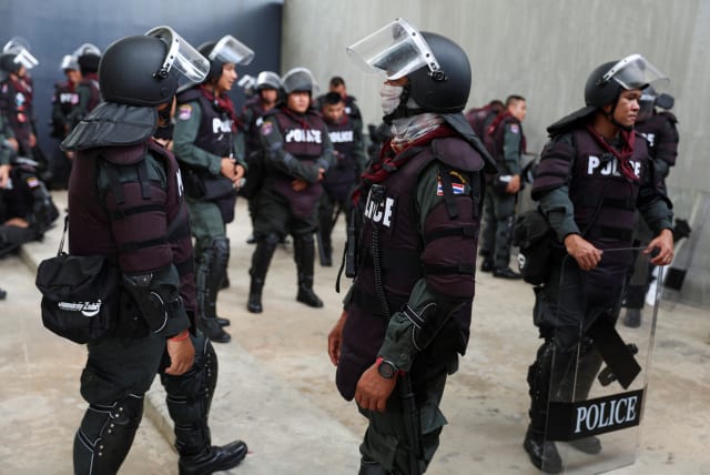  Police officers are seen on the day of the second vote for a new prime minister, at the parliament in Bangkok, Thailand, July 19, 2023. (photo credit: REUTERS/ATHIT PERAWONGMETHA)