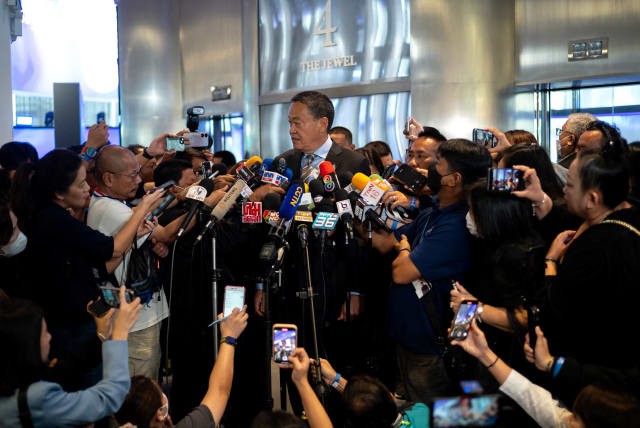  Thailand's Prime Minister Srettha Thavisin speaks to members of media inside the luxury Siam Paragon shopping mall after Thai police arrested a teenage gunman who is suspected of killing foreigners and wounding other people in a shooting, in Bangkok, Thailand, October 4, 2023. (photo credit: REUTERS/ATHIT PERAWONGMETHA)