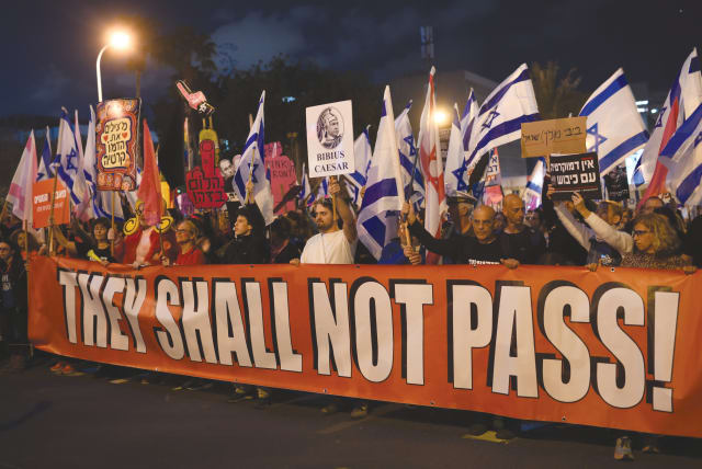  PROTESTERS RALLY in Tel Aviv against the government’s judicial reform plan, blocking the Ayalon highway, earlier this year. (photo credit: GILI YAARI/FLASH90)