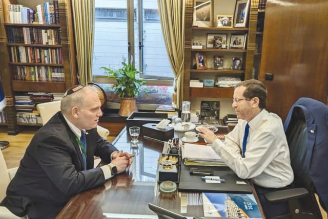  The writer confers with President Isaac Herzog at the President's Residence in Jerusalem. (photo credit: OFFICE OF THE PRESIDENT)
