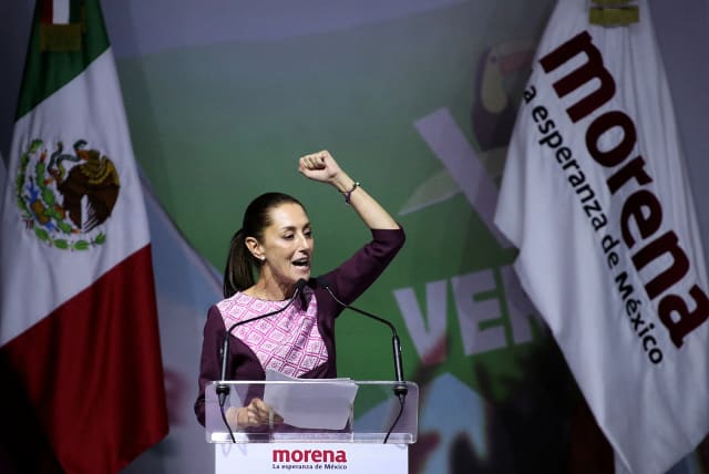  Former Mexico City Mayor Claudia Sheinbaum gestures as she speaks on the day she is certified as presidential candidate for the ruling National Regeneration Movement (MORENA) party during a ceremony, in Mexico City, Mexico September 10, 2023. (photo credit: REUTERS/HENRY ROMERO)