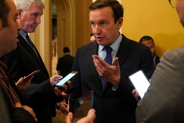  U.S. Senator Chris Murphy (D-CT) speaks to reporters before attending the weekly Democratic caucus luncheon at the U.S. Capitol in Washington, D.C., U.S., November 29, 2022. (photo credit: REUTERS/SARAH SILBIGER)