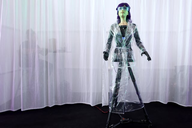  Yada Labs Artificial Intelligence called Desdemona, with a robotic body, stands on a stage and answers questions of visitors during the opening day of the international consumer technology fair IFA in Berlin, Germany September 1, 2023. (photo credit: REUTERS)