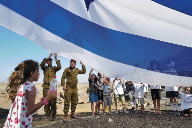 FOREVER SACRED: Yom Kippur War veterans, IDF soldiers, families, and friends gather at the memorial to those who fell in the 1973 Tel Saki battle, Sept. 27 (photo credit: MICHAEL GILADI/FLASH90)