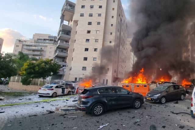  The scene where a rocket fired from Gaza into Southern Israel, hit and caused damaged in the southern Israeli city of Ashkelon. October 7, 2023.  (photo credit: EDI ISRAEL/FLASH90)