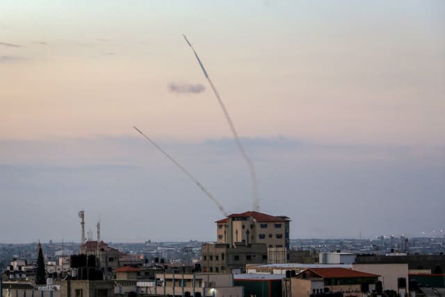  Hamas fires a large number of rockets towards Israel in the city of Rafah in the southern Gaza Strip, October 7, 2023.  (photo credit: ABED RAHIM KHATIB/FLASH90)