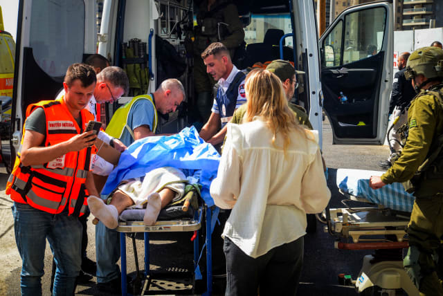  Wounded Israelis arrive to the Soroka Medical center in Beer Sheva, southern Israel, October 7, 2023.  (photo credit: DUDU GREENSPAN/FLASH90)