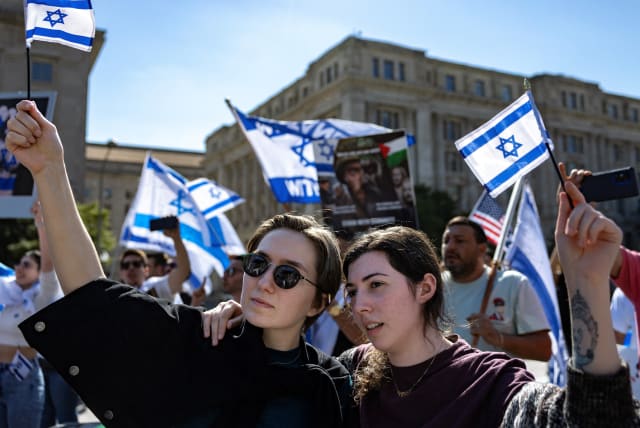   Kay and Hannah Dubrow attend a "Stand with Israel" rally at Freedom Plaza in Washington, U.S., October 13, 2023. (photo credit: REUTERS/EVELYN HOCKSTEIN)