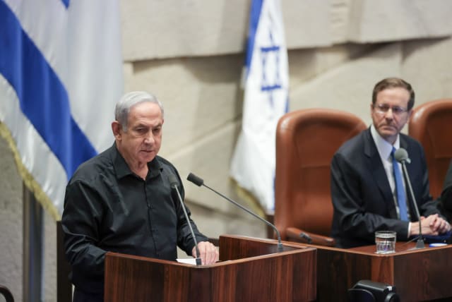  Prime minister Benjamin Netanyahu attends a plenum session in the Israeli parliament on October 16, 2023. (photo credit: NOAM REVKIN FENTON/FLASH90)