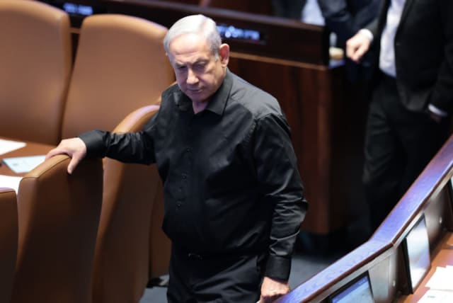  Israeli Prime minister Benjamin Netanyahu attends a plenum session in the Israeli parliament on October 16, 2023 (photo credit: NOAM REVKIN/FLASH90)