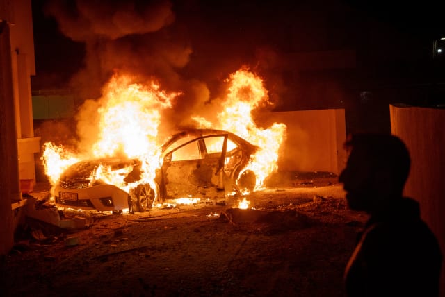  Israeli security forces at the scene where a rocket fired from the Gaza Strip hit a home and a car in the southern Israeli city of Sderot, October 17, 2023.  (photo credit: YONATAN SINDEL/FLASH90)