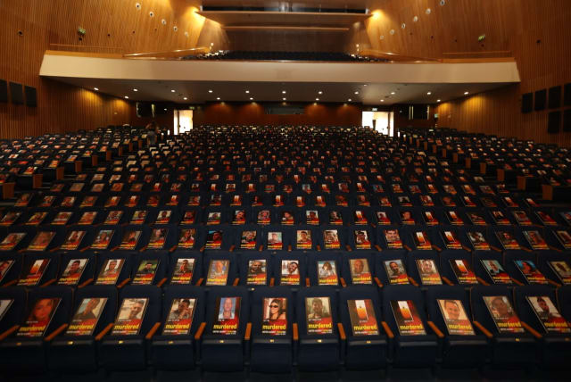  Exhibit at Tel Aviv University: United Against Terrorism, Photos of murdered, missing and kidnapped people mounted on more than 1,000 empty seats in auditorium. (photo credit: CHEN GALILI)