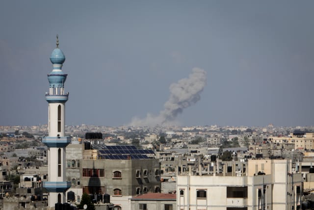  Smoke rises after Israeli airstrikes, of the city of Rafah in the southern Gaza Strip, on October 19, 2023 (photo credit: ABED RAHIM KHATIB/FLASH90)