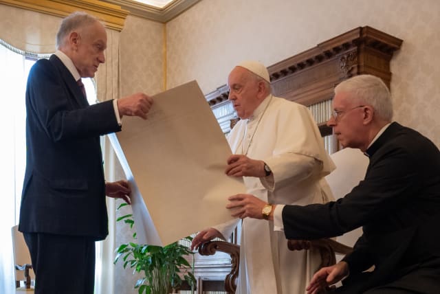  World Jewish Congress President Ronald Lauder gives Pope Francis a a “Kishreinu” (Hebrew for “Our Bond”) document marking influence of the Catholic Church's Nostra Aetate declaration on Catholic-Jewish relations, Oct. 19, 2023.  (photo credit: SHAHAR AZRAN / WJC)