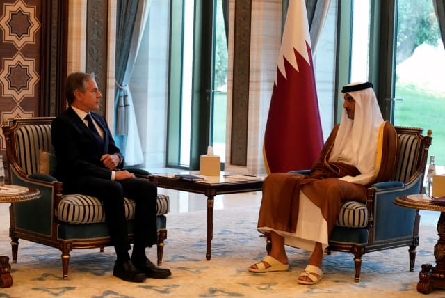  US Secretary of State Antony Blinken and Qatari Emir Sheikh Tamim bin Hamad Al Thani attend a meeting in Lusail, Qatar, Friday Oct. 13, 2023 (photo credit: JACQUELYN MARTIN/POOL/REUTERS)