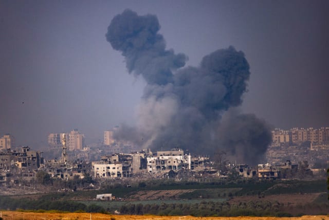  Smoke rises during Israeli airstrikes, in the Gaza Strip, as seen from the Israeli side of the border, on October 28, 2023 (photo credit: YONATAN SINDEL/FLASH90)