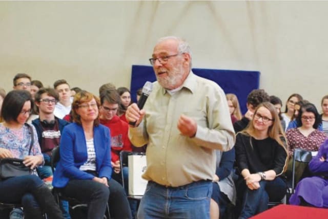  Alex Dancyg lectures a group of educators in Poland. (photo credit: Dancyg family)