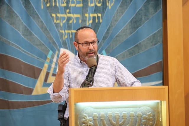  Zvika Mor, a father of one of the hostages, addresses students at the Jerusalem College of Technology.  (photo credit: MICHAEL ERENBURG)