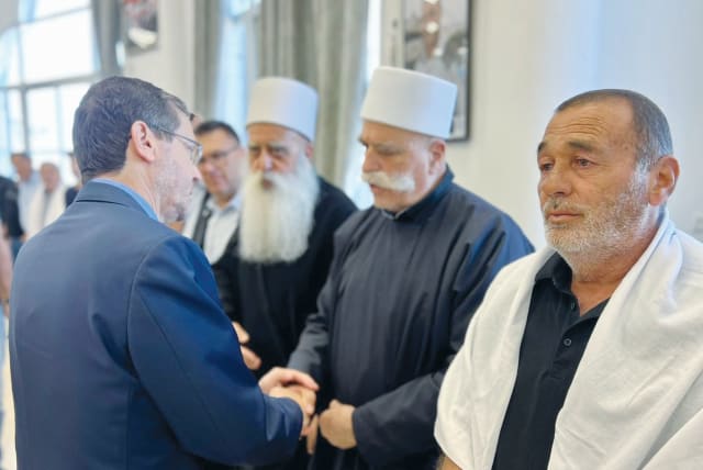  PRESIDENT ISAAC HERZOG pays a condolence call to the Druze community. (photo credit: Courtesy President’s Spokesman’s Office)