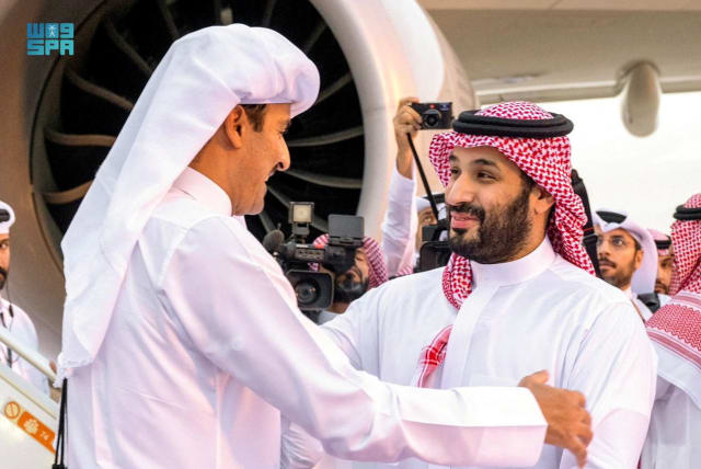  Saudi Crown Prince Mohammed bin Salman receives Qatar's Emir Sheikh Tamim bin Hamad al-Thani upon his arrival in Riyadh, Saudi Arabia, November 10, 2023.  (photo credit: SAUDI PRESS AGENCY/HANDOUT VIA REUTERS)