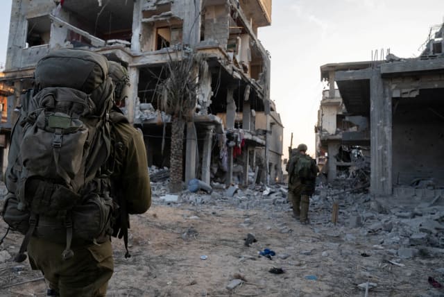  Israeli soldiers operate inside the Gaza Strip, amid the ongoing ground operation of the Israeli army against Hamas, November 11, 2023 (photo credit: IDF/Handout via REUTERS)