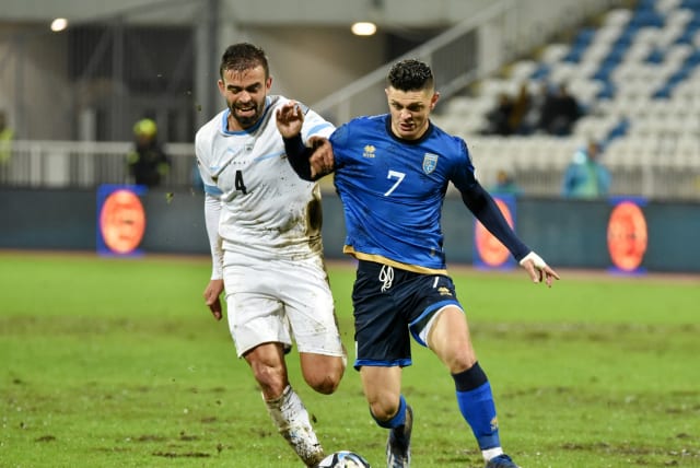 ISRAEL DEFENDER Miguel Vitor (left) and the National Team were a step behind Milot Rashica (right) and Kosovo throughout their Euro Group I qualifier on Sunday night at Fadil Vokrri Stadium in Pristina, which the visiting blue-and-white lost 1-0. (photo credit: LAURA HASANI/REUTERS)