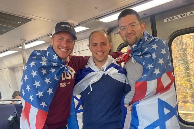  From left: Ari Barnett, Moshe Felson and Asher Blum on their way to the pro-Israel rally in Washington, D.C., Nov. 14, 2023.  (photo credit: RON KAMPEAS via JTA)