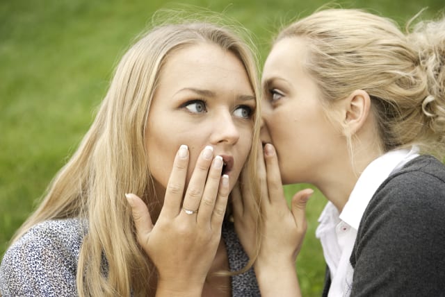  An illustrative image of two women sharing a secret. (photo credit: INGIMAGE)