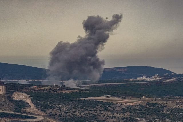  Smoke and flares during an exchange of fire between the IDF and Hezbollah terrorists on the border between Israel and Lebanon, November 12, 2023. (photo credit: AYAL MARGOLIN/FLASH90)