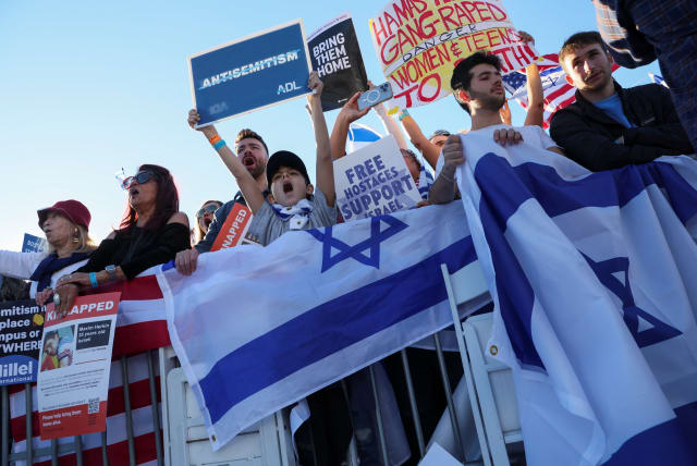  Israeli Americans and supporters of Israel gather in solidarity with Israel and protest against antisemitism, amid the ongoing conflict between Israel and the Palestinian group Hamas, during a rally on the National Mall in Washington, U.S, November 14, 2023. (photo credit: REUTERS/LEAH MILLIS)
