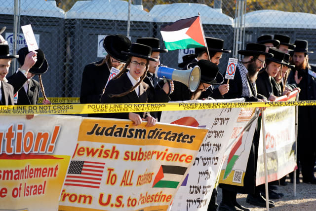  Members of the Neturei Karta, a group opposed to Zionism and Israel, counter demonstrate as Israeli Americans and supporters of Israel gather in solidarity with Israel and protest against antisemitism, amid the Israel-Hamas war, in Washington, US, November 14, 2023. (photo credit: REUTERS/Elizabeth Franz)