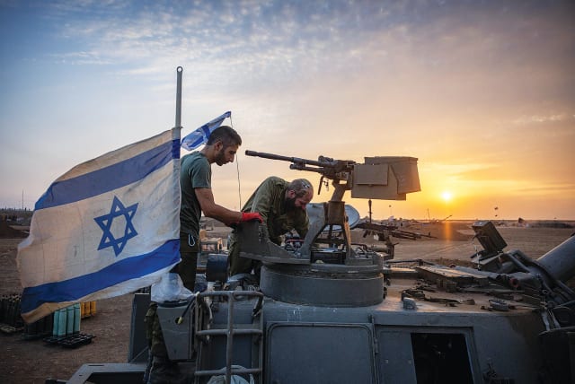  IDF RESERVE soldiers in an artillery unit are stationed near the border with Gaza this week. (photo credit: YONATAN SINDEL/FLASH90)