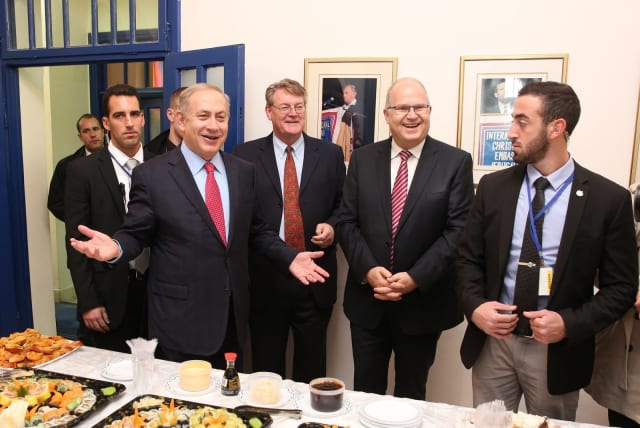  Israeli Prime Minister Benjamin Netanyahu visits the International Christian Embassy Jerusalem for Christmas 2016. (photo credit: ICEJ)