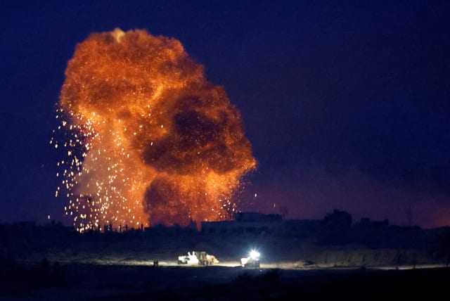  An explosion takes place during Israeli airstrikes over Gaza, as seen from southern Israel, amid the ongoing conflict between Israel and the Palestinian group Hamas, November 22, 2023. (photo credit: REUTERS/ALEXANDER ERMOCHENKO)