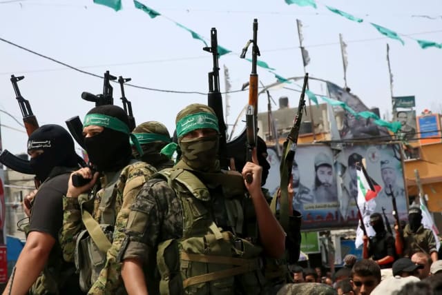  An illustrative image of Hamas terrorists. (photo credit: REUTERS)
