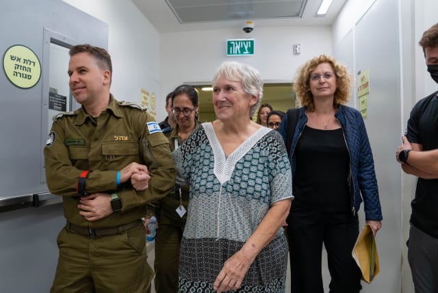  Hannah Katzir excitedly moves forward to reunite with family after being kidnapped by Hamas and falsely reported as dead by Palestinian Islamic Jihad. (photo credit: IDF SPOKESPERSON UNIT)
