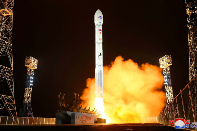  A rocket carrying a spy satellite Malligyong-1 is launched, as North Korean government claims, in a location given as North Gyeongsang Province, North Korea in this handout picture obtained by Reuters on November 21, 2023 (photo credit: KCNA VIA REUTERS)