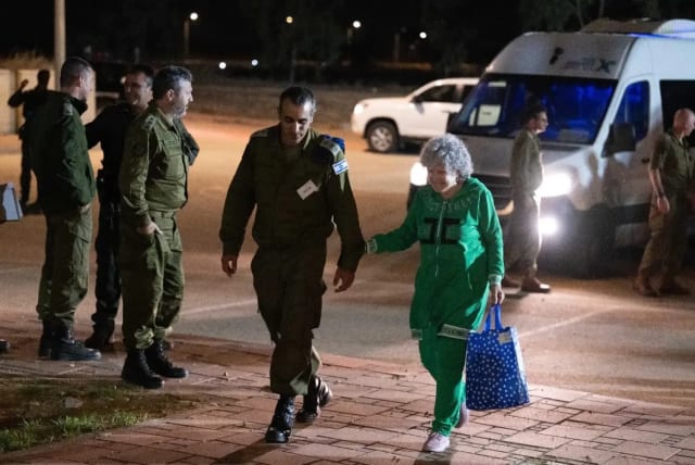  Ruti Munder is escorted by IDF forces on November 24, 2023 (photo credit: IDF SPOKESPERSON'S UNIT)
