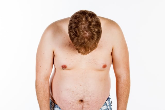 Breast growth in men - Why does it happen? (photo credit: INGIMAGE)