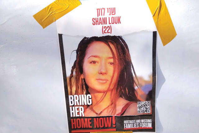  A sign demands the release of Shani Louk, before it was confirmed that she had been (photo credit: DAVID JABLINOWITZ)
