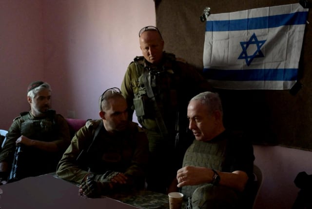  Israeli Prime Minister Benjamin Netanyahu visits Gaza Strip, during a temporary truce between Hamas and Israel, in this handout obtained by Reuters on November 26, 2023. (photo credit: Avi Ohayon/GPO/Handout via REUTERS)