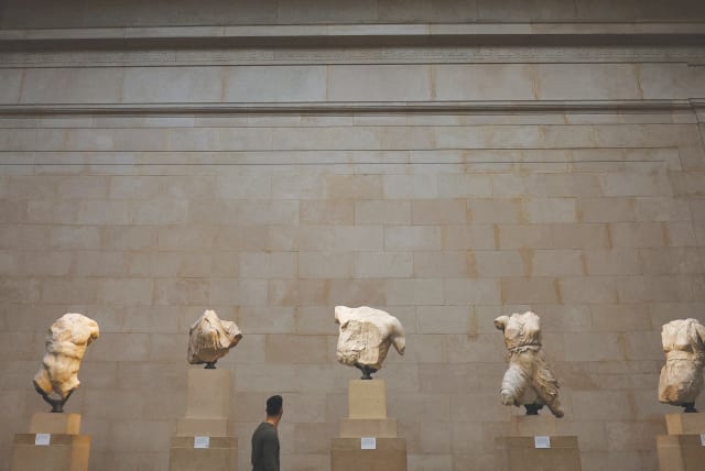  RELEGATED TO a display: At the British Museum, sculptures from the Parthenon, the temple on Athens’ Acropolis that stood as a Greek monument to democracy. (photo credit: HANNAH MCKAY/ REUTERS)