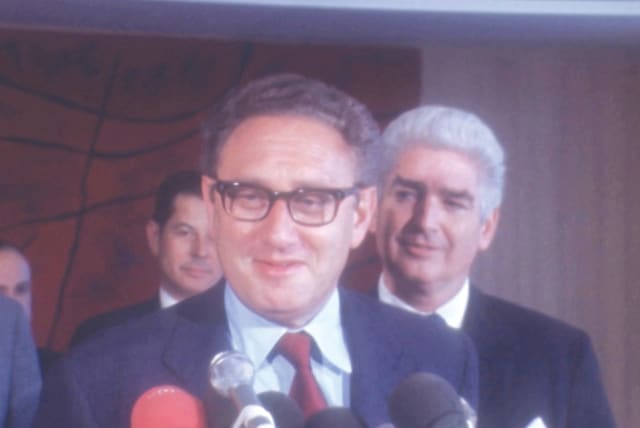  HENRY KISSINGER, then serving as US national security advisor, speaks to the press at Orly Airport ahead of talks on the Paris Peace Accords with the Vietnamese, June 1973.  (photo credit: REUTERS)